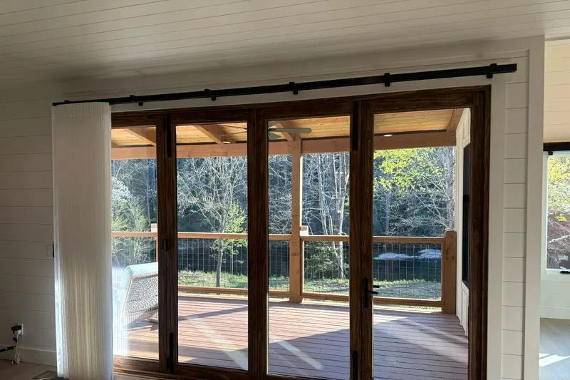 SmartDrape stacked neatly to the left of a four-panel patio door