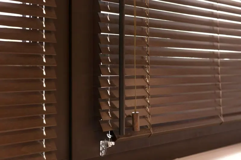 Close view of stained wood blind slats